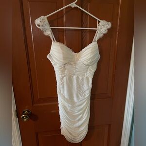 White corset mini dress with lace sleeve detail